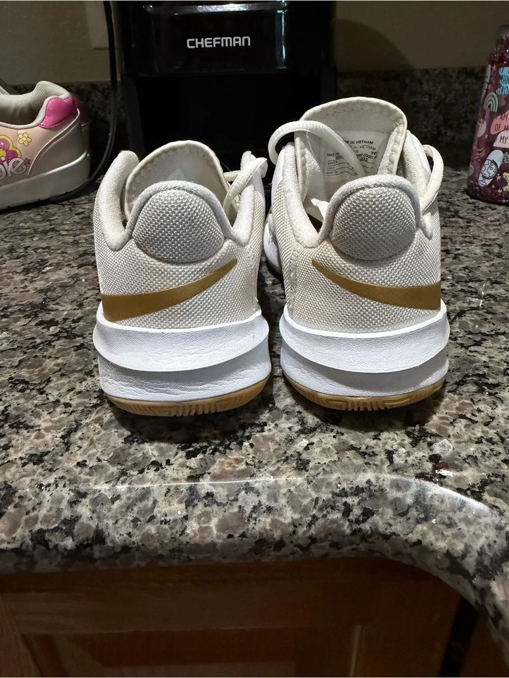 Nike Kids White Sneakers with Metallic Gold Accents